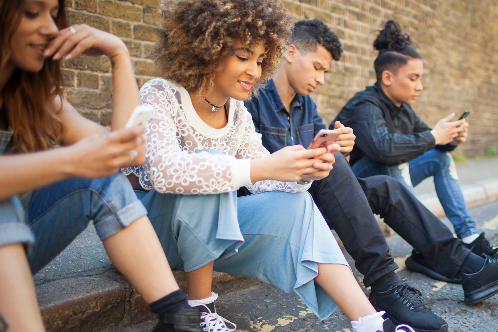 Assets - Young People on Mobile phones